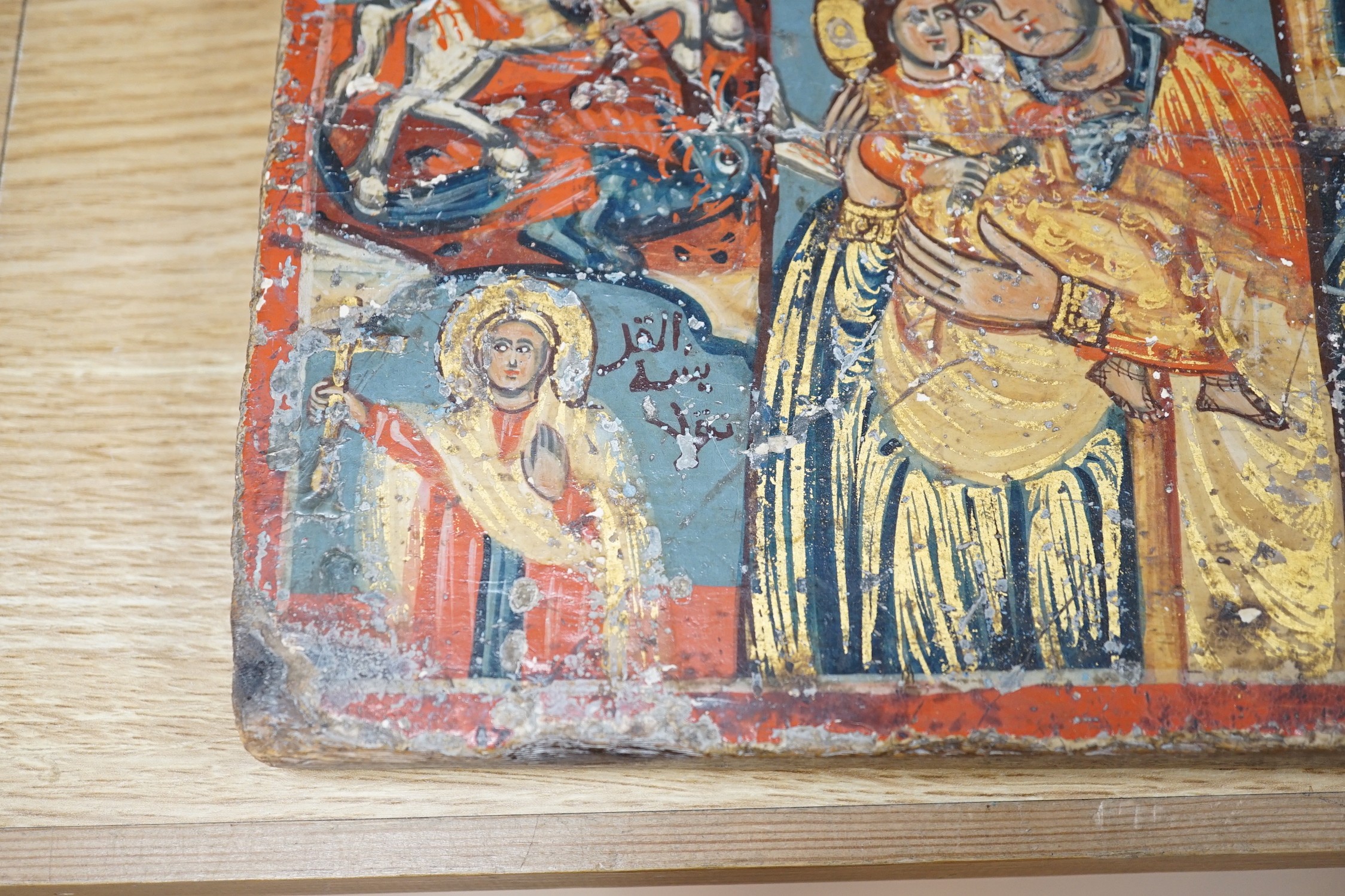 Two polychrome icons, largest 30cms high
